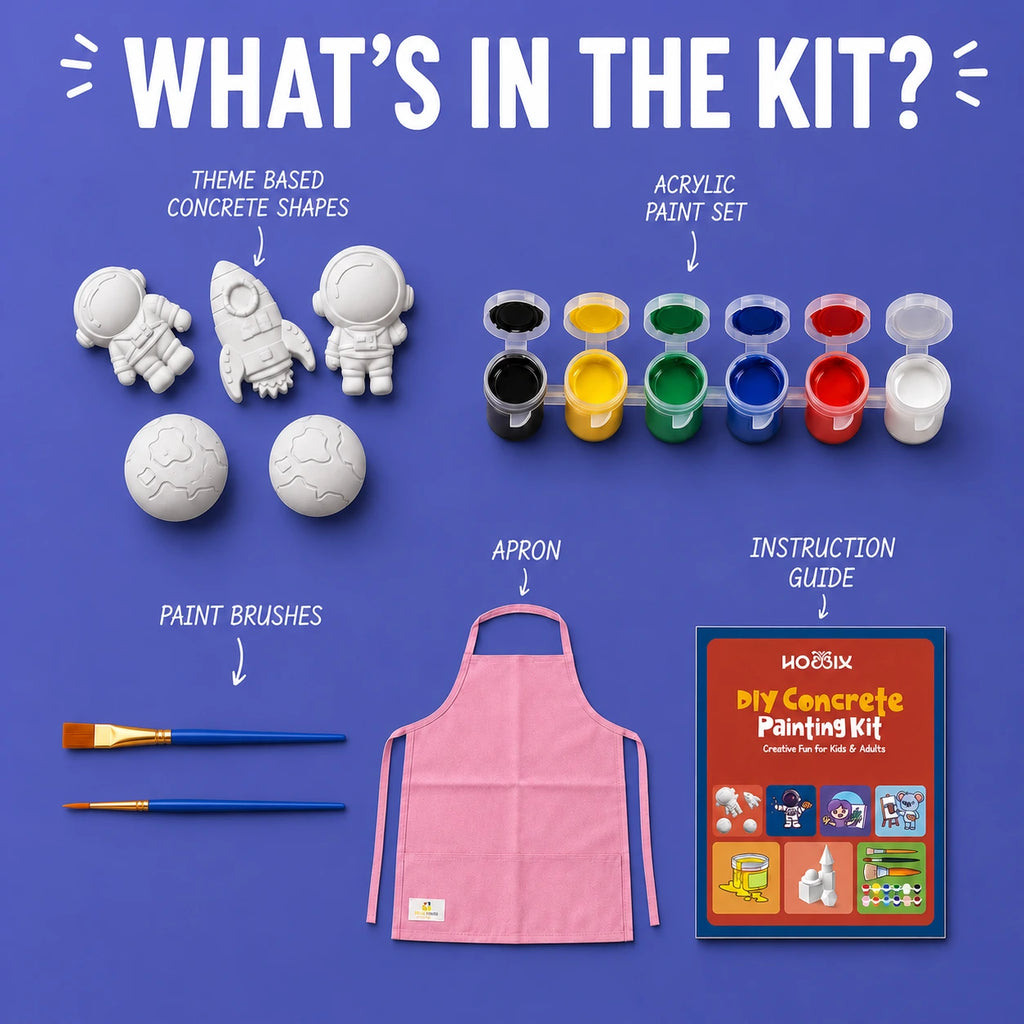 A flat-lay product kit display on a blue background titled "WHAT'S IN THE KIT?" showing a DIY concrete painting kit contents: concrete shapes, an acrylic paint set, paint brushes, a pink apron, and an instruction guide.