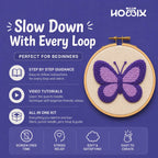 Promotional graphic for a punch needle kit showing a completed purple and lavender butterfly in a wooden hoop on a blue background. Text reads 'Slow Down With Every Loop' and lists features like step-by-step guidance, video tutorials, and all-in-one kit. Benefits are screen-free time, stress relief, soft & satisfying and easy to create.