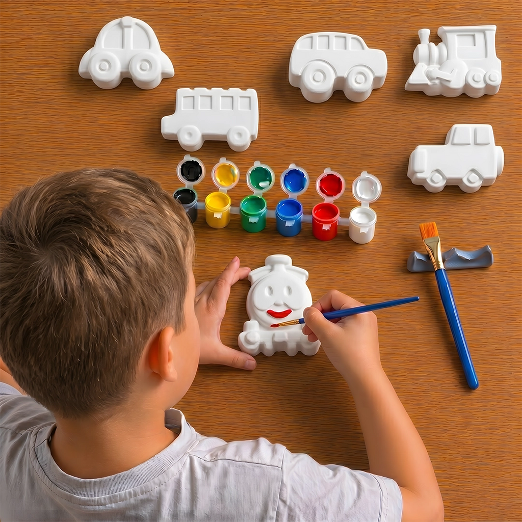 Child painting a concrete toy car with various paint colors and tools on a wooden table.
